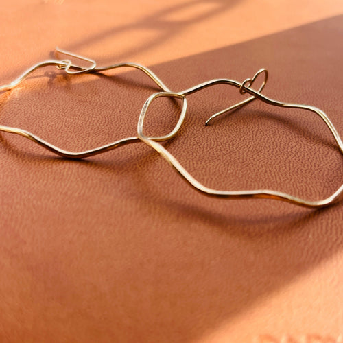 BIG WAVE HOOP EARRINGS